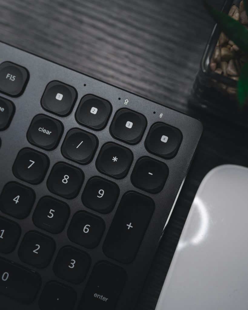 Close up of the number keys on a black keyboard