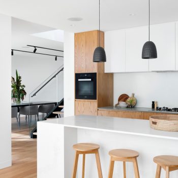 A modern looking kitchen area of a condo unit